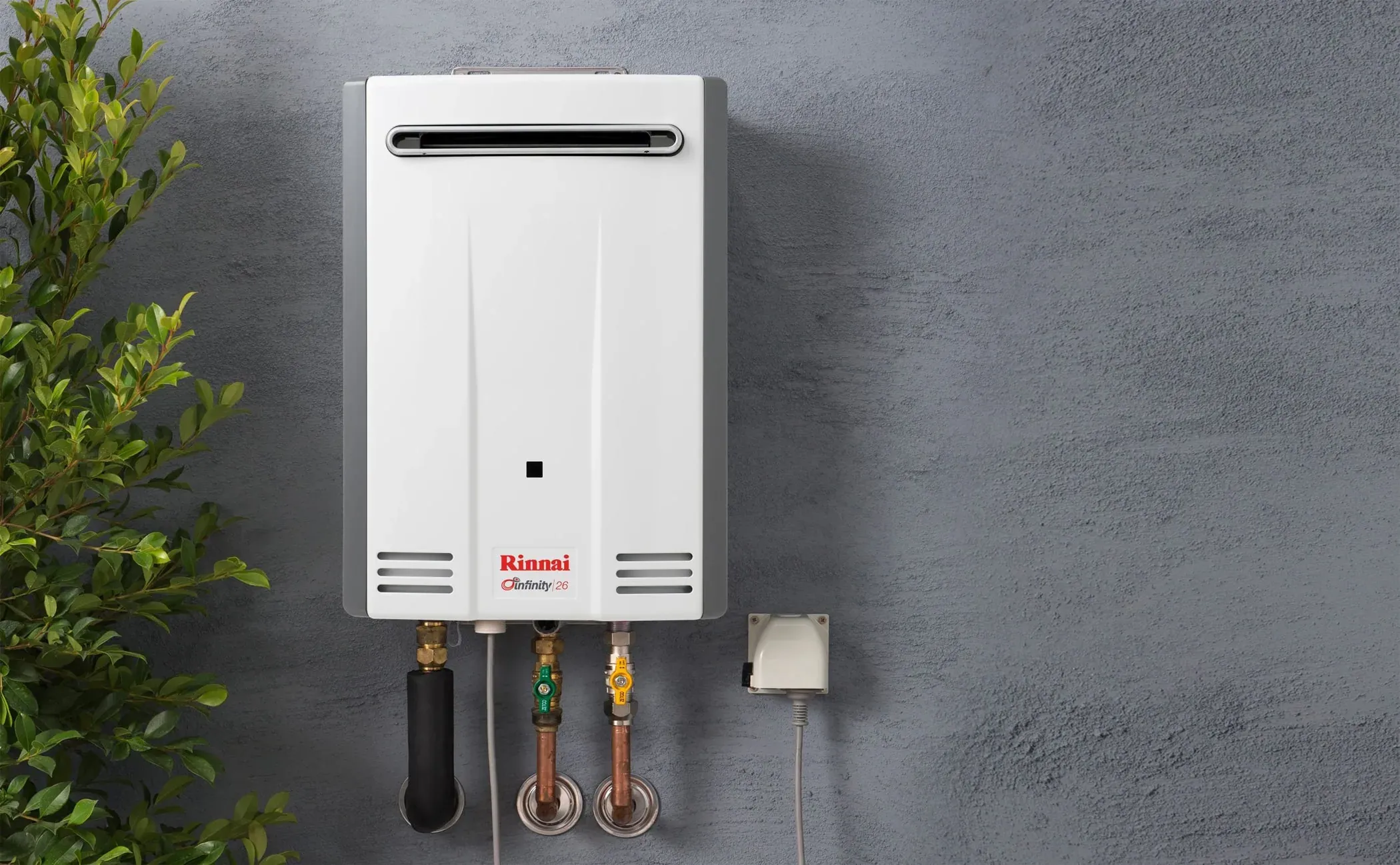 Gas continuous flow hot water unit mounted on an outside wall