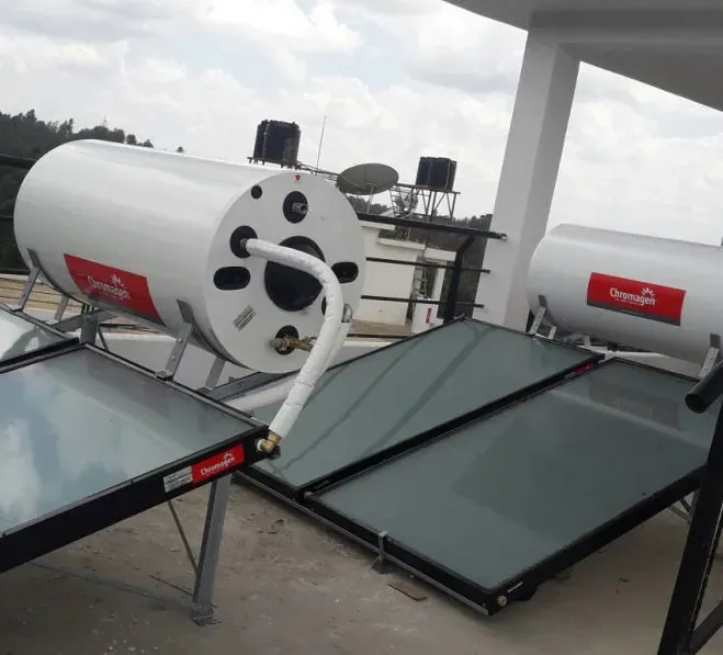Flat plate solar hot water collectors with roof-mounted tanks