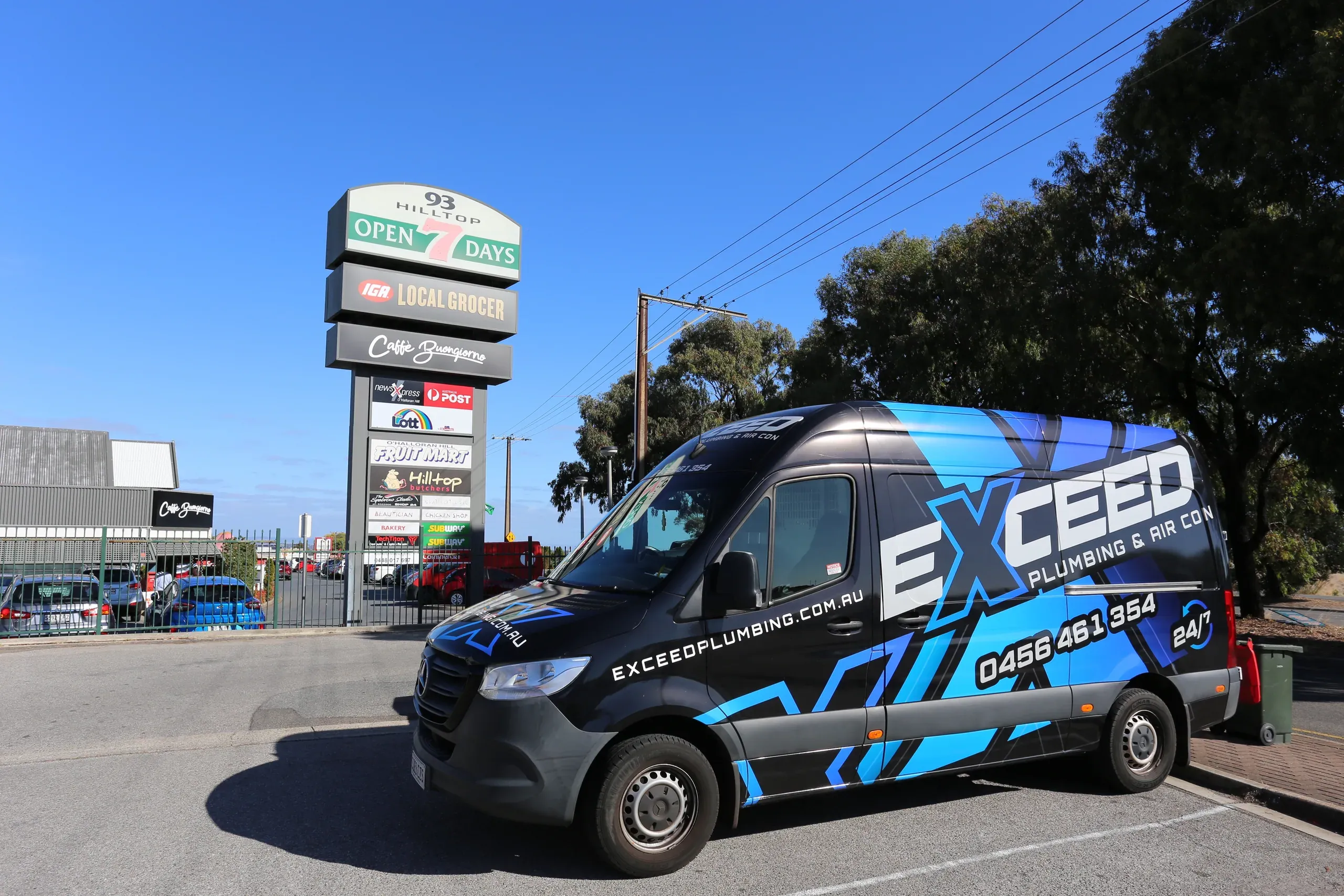 The Exceed Plumbing van outside the shopping centre in Happy Valley