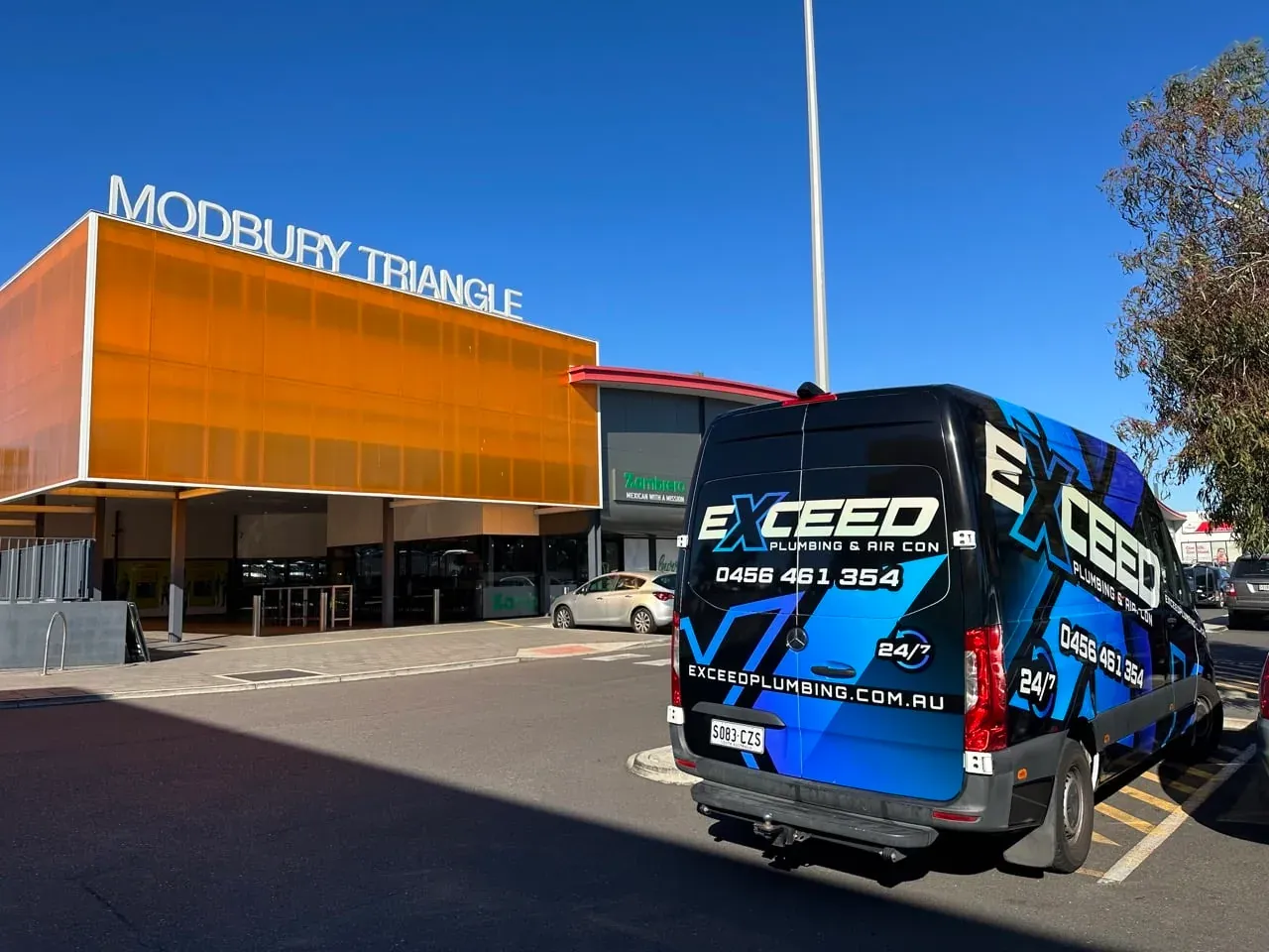 The Exceed Plumbing van outside the Modbury Triangle shopping centre
