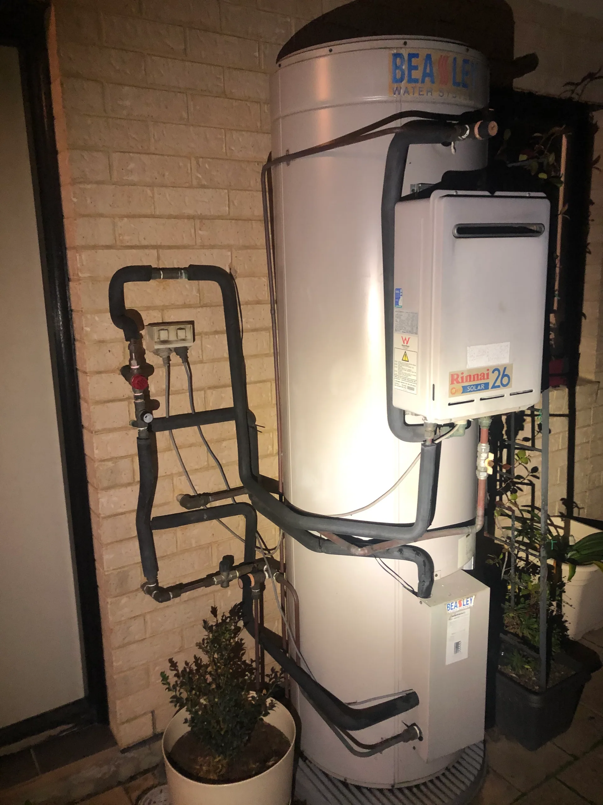 Solar hot water storage tank with a Rinnai gas booster