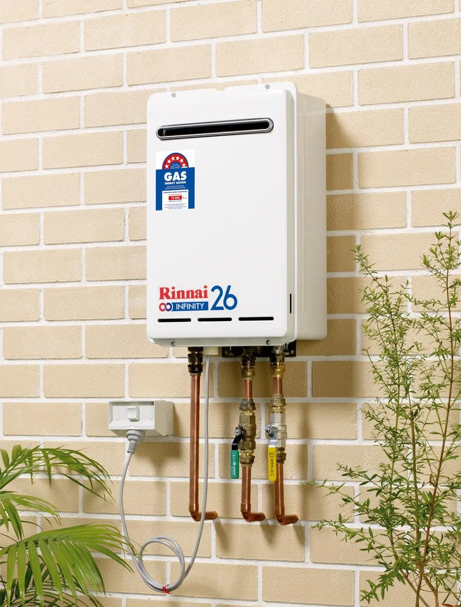 A Rinnai 26 continuous flow hot water system on a rendered wall